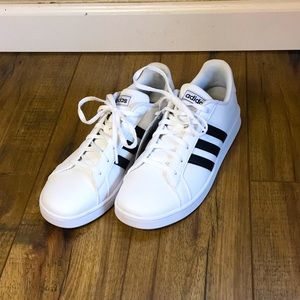 Brand new never worn white and black adidas